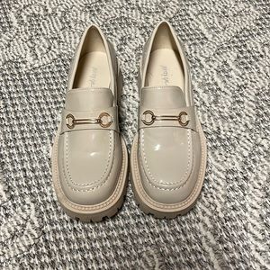 Cream patent leather loafers